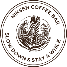 Niksen Coffee Bar seal — slow down and stay a while